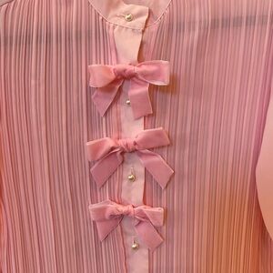 Elegant Pink Pleated Blouse with Bows